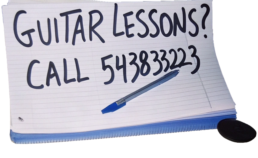 a-handwritten-note-that-says--guitar-lessons--call.png